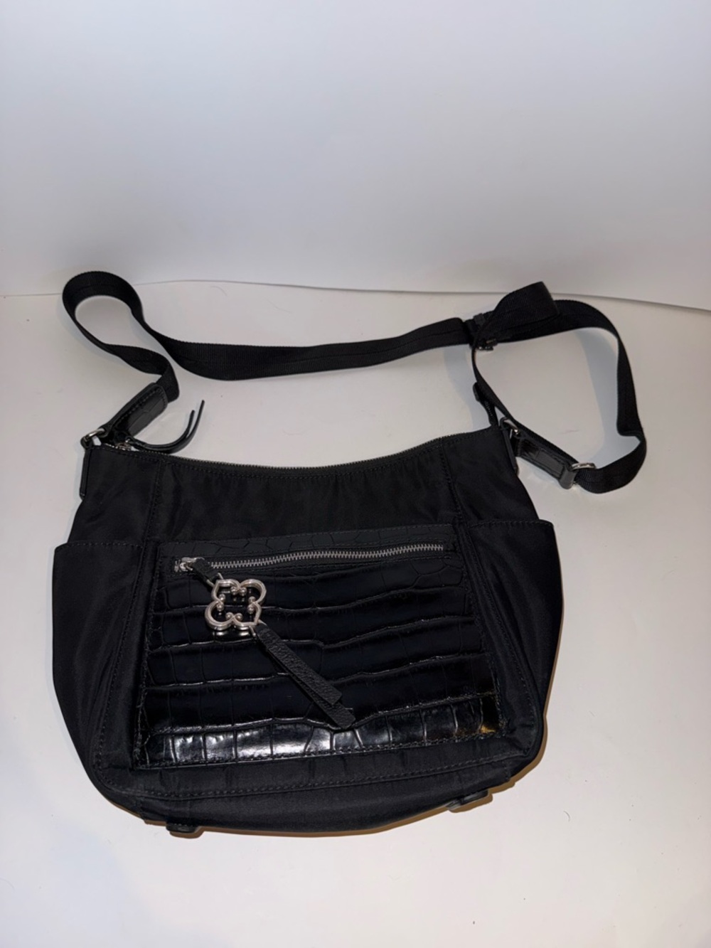 Brighton Black Crossbody Bag with Quilted Front Pocket and Silver Charm